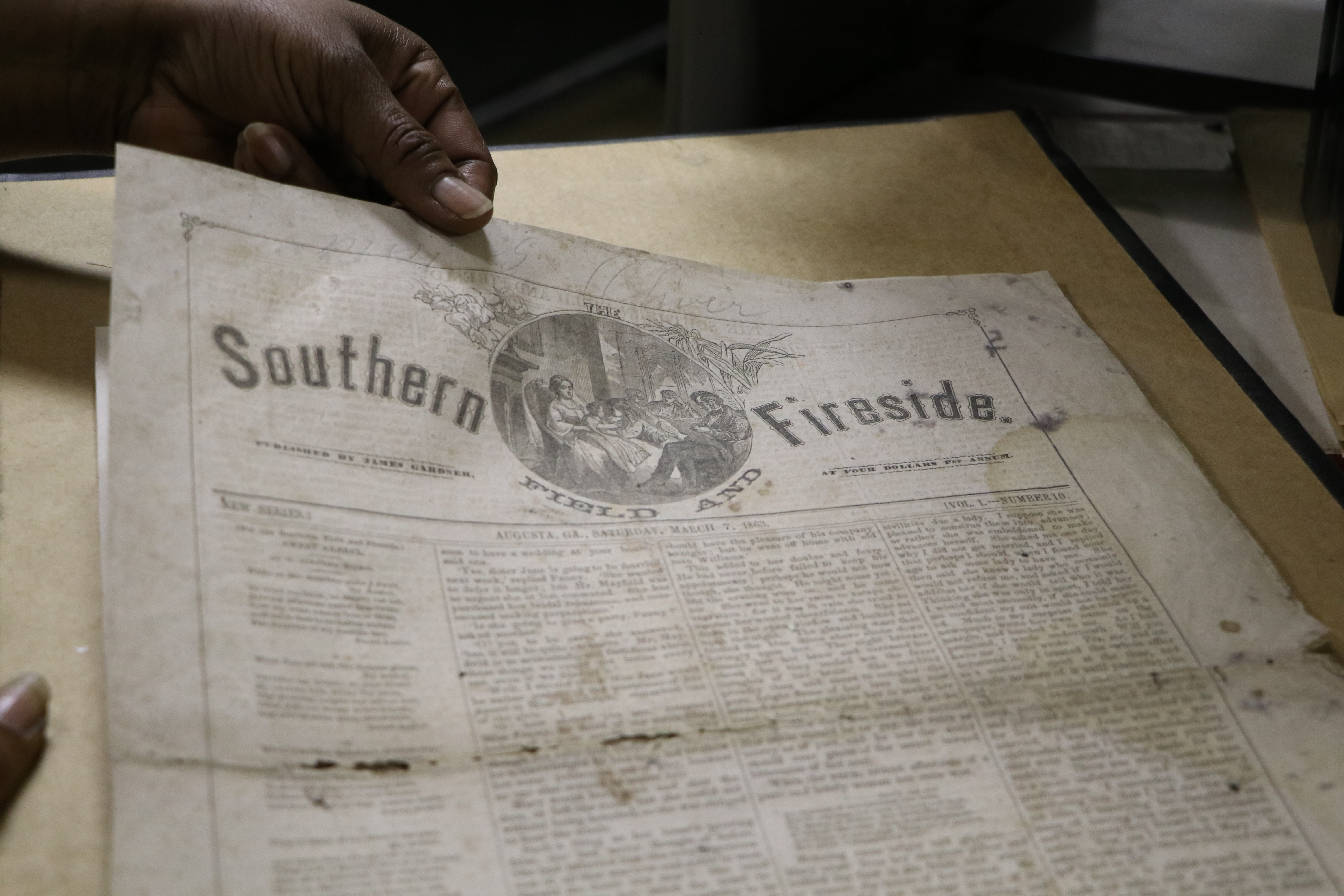 Yellowed newspaper "Southern Fireside"