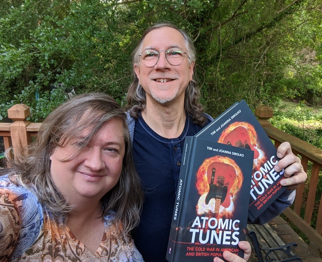 Tim and Joanna Smolko pose with copies of their new book